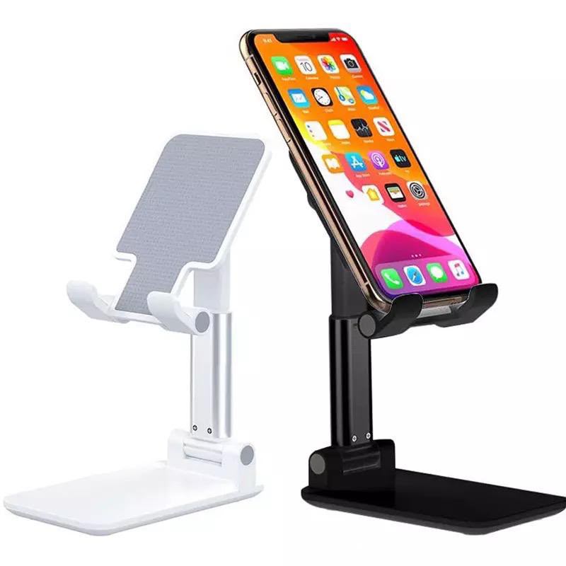 Adjustable desktop phone holder